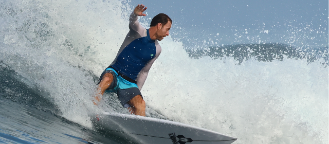 George surfing while wearing Comfort-Truss
